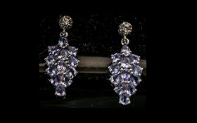 Pair of Tanzanite Cluster Drop Earrings, pear cut tanzanites, totalling 3.