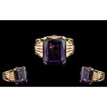 Ladies 18ct Gold - Attractive Single Stone Emerald Cut Amethyst Set Dress Ring. The Emerald Cut