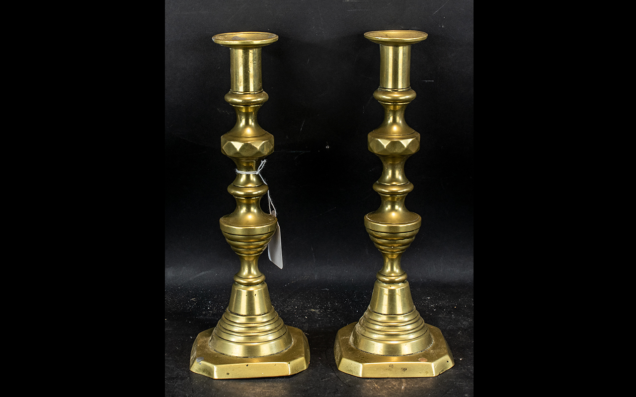 Pair of Victorian Brass Candlesticks height 11 inches.