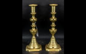 Pair of Victorian Brass Candlesticks height 11 inches.