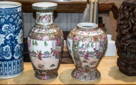Two Modern Canton Style Famille Rose Decorated Vases, height 16" and 13".