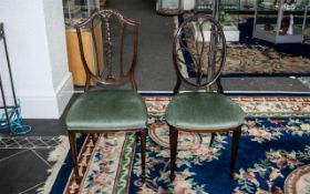 *WITHDRAWN* Two Elegant Edwardian Mahogany Salon Chairs with finely carved backs in the Sheraton