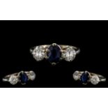 Ladies 18ct White Gold - Attractive 3 Stone Sapphire and Diamond Ring.
