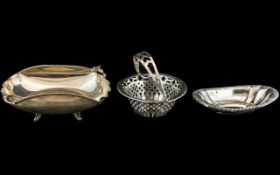 Three Various Silver Bowls comprising a bonbon dish, a pin tray and a shaped bowl,