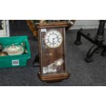 A William Widdop Wall Clock enamel chapter dial with Roman numerals, striking on a bell,