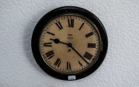 A Smiths 8-Day Circular School Clock, enamelled dial with Roman numerals. Diameter 15".