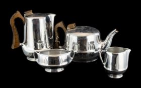 Four Piece Stainless Steel Picquot Ware Set, comprising a Tea Pot, Hot Water/Coffee Jug,