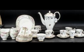 A Royal Stafford Enchantment Design Coffee Service comprising 6 tea cups and saucers along with a