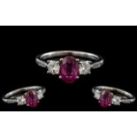 18ct White Gold - Attractive Contemporary Ruby and Diamond Set Dress Ring.