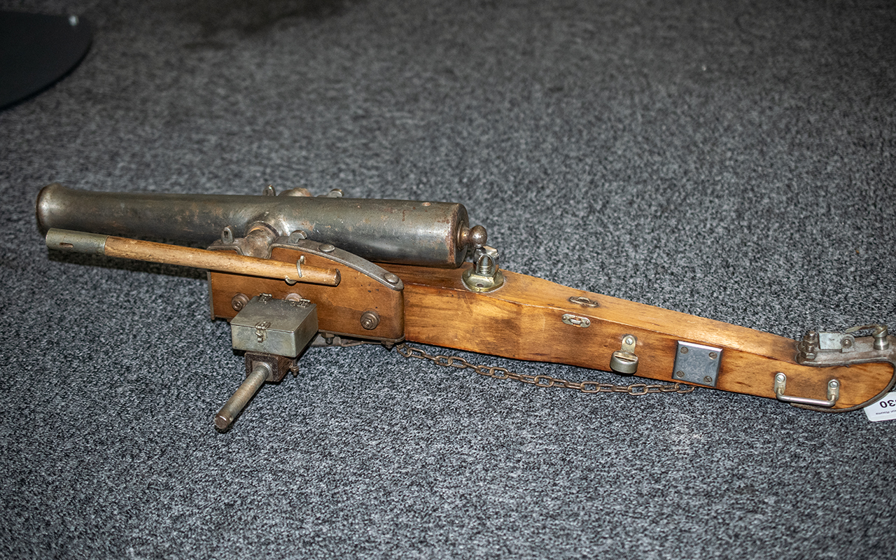 A Replica Field Cannon in teak wood and steel, lacking wheels. Length 28''. - Image 2 of 3