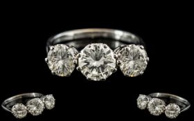 18ct White Gold and Platinum Excellent Quality 3 Stone Diamond Ring. Marked Platinum and 18ct.