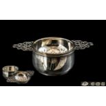 George V - Pleasing Good Quality Sterling Silver Twin Handle Tea Strainer and Small Bowl ( Draining