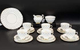 Royal Vale Bone China Tea Service, in white with small star print and gilt trim,