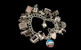 1960's Vintage Sterling Silver Charm Bracelet Loaded with 18 Quality Silver Charms.