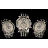 Ladies Juicy Couture Watch, with silver crystal decorated strap, a large crystal on face, and