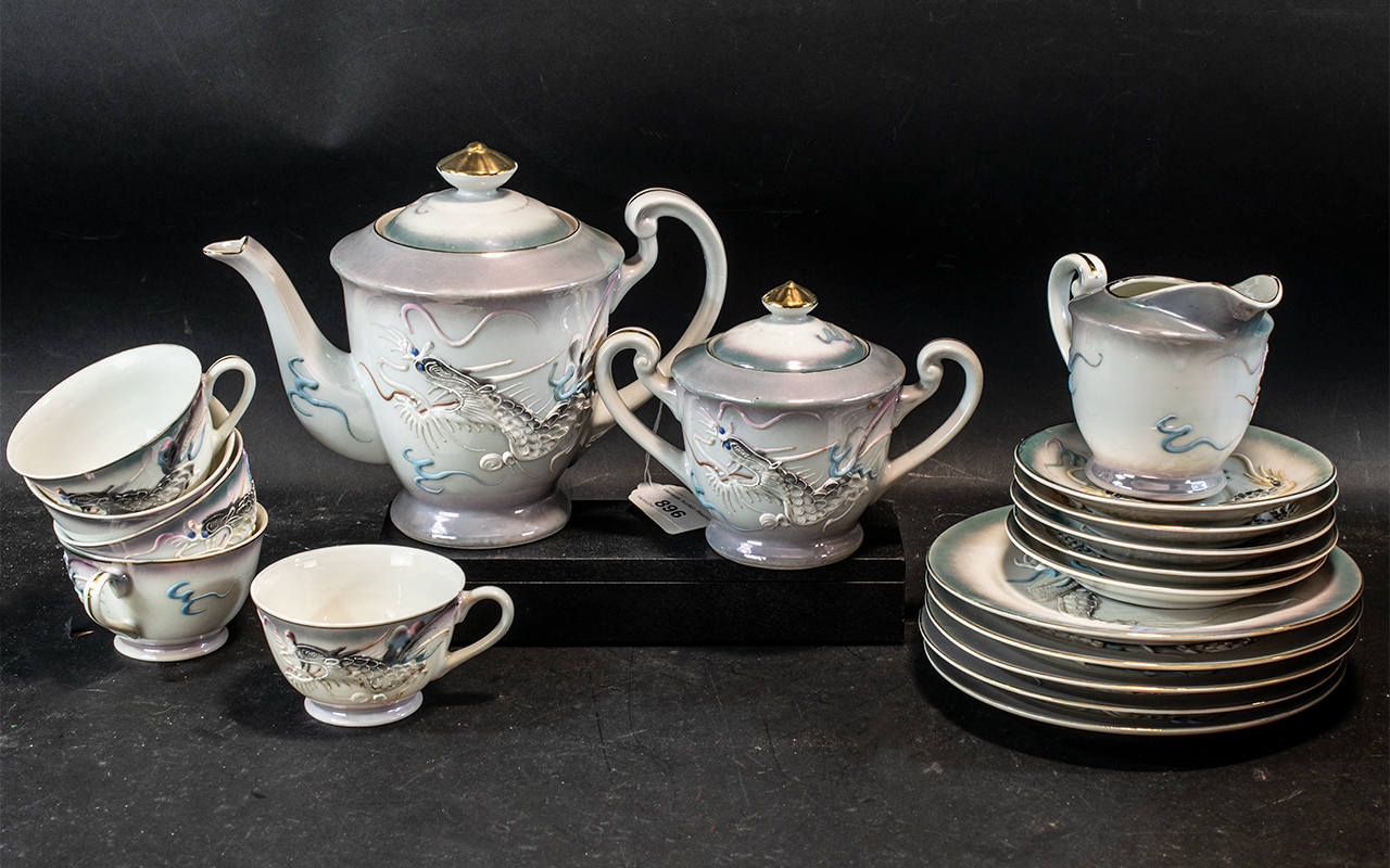 Oriental Tea Service, comprising tea pot, milk jug and sugar bowl, with five cups,