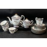 Oriental Tea Service, comprising tea pot, milk jug and sugar bowl, with five cups,