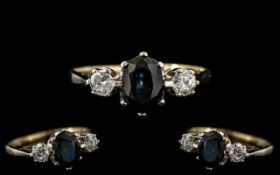 Ladies 9ct Gold - Attractive 3 Stone Diamond & Sapphire Set Dress Ring.