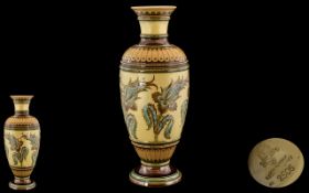 Large Mettlach Pottery Vase No. 2506, decorated to the body with raised floral patterns in the