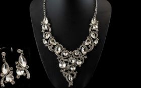 White Crystal Statement Necklace and Earrings Set, an articulated Y shaped necklace of elegant