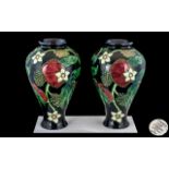 Country Craft Collection Pair of Tube lined Floral Vases. Designed In England by Rowe. Date 2003.