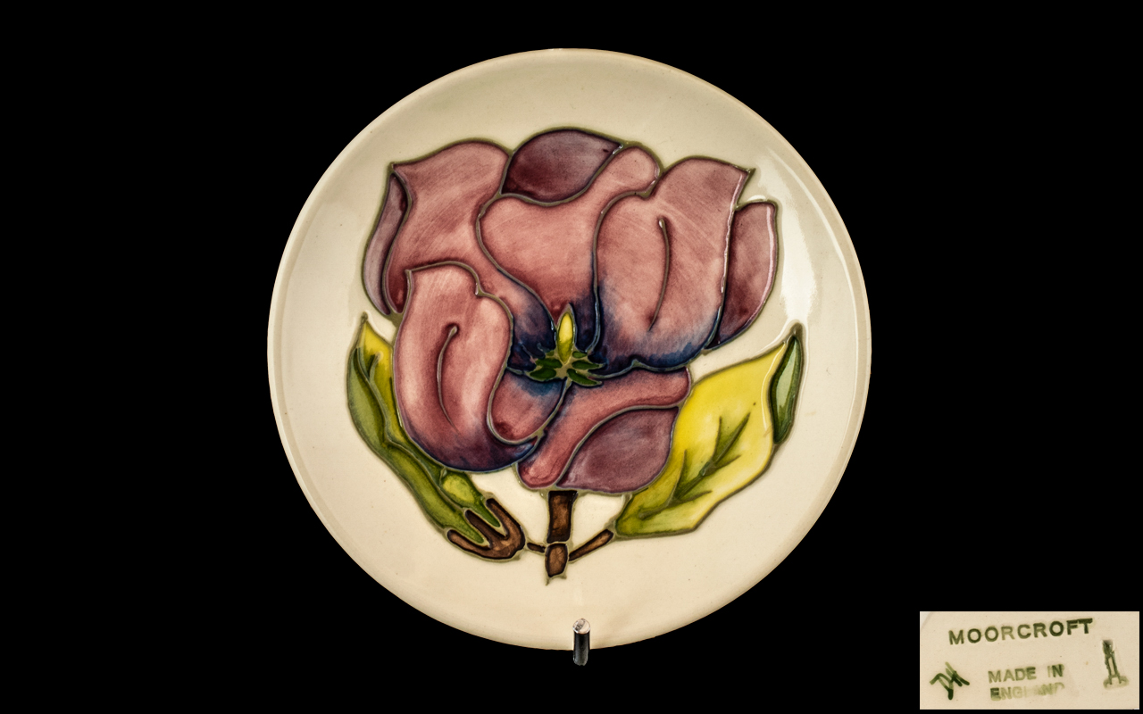 Moorcroft Pin Dish, Cream with Pink Magnolia, measures 4.5" diameter. In excellent condition.