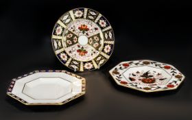 Three Royal Crown Derby Imari Plates model 2451 8687 a.1315. Largest diameter 9 inches.