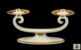 Rosenthal Porcelain Double Candle Holder, with cream ground with gilt highlights and borders.