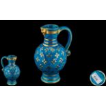 Minton Late 19th Century Hand Painted Turquoise and Gold Mask Spout Jug of Bulbous Form.