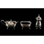 Three Piece Silver Cruet/ Condiment Set with blue glass liners, hallmarked Sheffield, 1946,