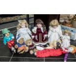 Collection of Dolls & Toys, comprising four bisque headed dolls in Victorian costume, on metal