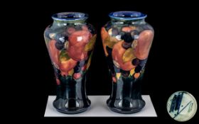 William Moorcroft Signed Fine Pair of Vases of Tapered Form and Excellent Lustre ' Pomegranates '