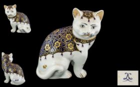 Sevres Porcelain Standing Cat, finely decorated in gilt on a cobalt blue ground; Sevres mark to