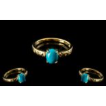 Turquoise Solitaire Ring, size Q, an oval cut cabochon of matrix free turquoise,