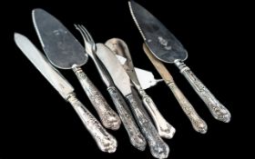 Eight Silver Hilted Cutlery Items