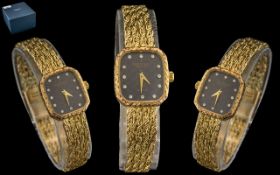 Raymond Weil Ladies Wristwatch - Ladies Gold Plated Raymond Weil wristwatch with a stone set