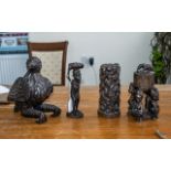 Collection of Four Wooden Carvings comprising a 8" figure of a woman,