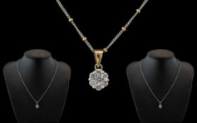 Ladies - Attractive 9ct Gold Diamond Set Pendant - Attached to a 9ct Two Tone Gold Chain.