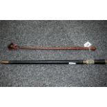 Two Sword Sticks in the Shape of a Leather Riding Crop, 20 inches (50cms) long,