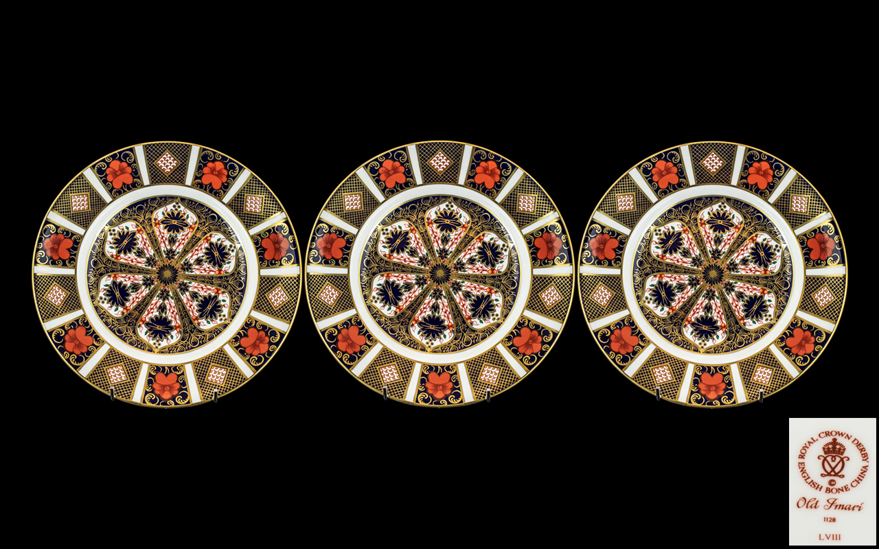 Royal Crown Derby Trio of Hand Painted ' Old Imari ' Pattern 22ct Gold Single Band Cabinet Plates.