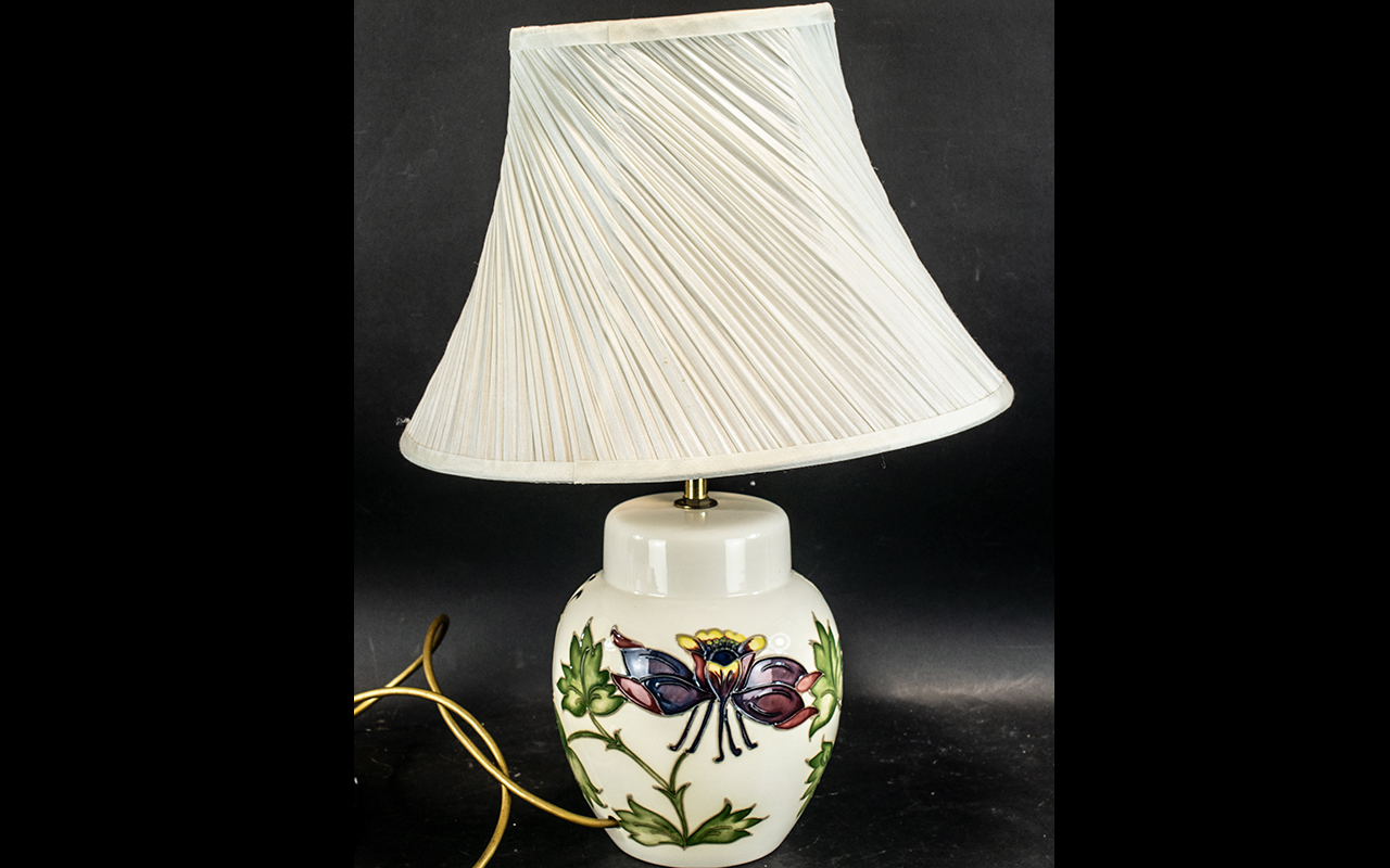 Moorcroft Columbine Table Lamp with shade, tubelined decoration in pink and green on a cream base.