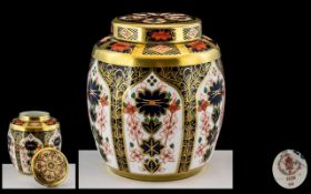 A Royal Crown Derby 1128 Cigar Pattern Ginger Jar and Cover height 4 1/2 inches.