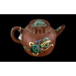 A Chinese Small Clay Tea Pot Yixing, decorated in coloured enamels, height 3.25".