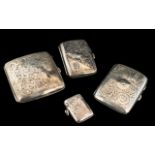 Three Silver Cigarette Boxes, all early 20th Century, bangs and dents,