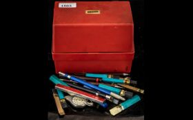 Red Box of items containing 3 clutch pen