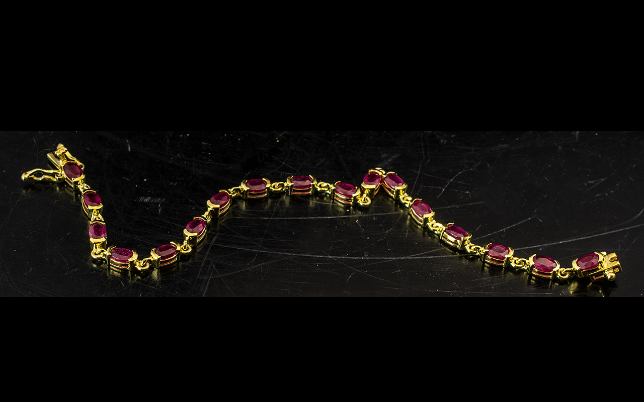 Ruby Tennis Bracelet, 10+cts of oval cut