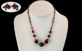 Ladies 1920's Naturalistic Red Faceted Glass Ornate Necklace, with matching earrings.