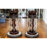 A Pair of Victorian Ruby Glass Lustres, with glass prisms, gilt highlights,