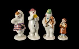 Royal Doulton Snowmen Figures, comprising 'Trumpeter Snowman', 'Violinist Snowman',