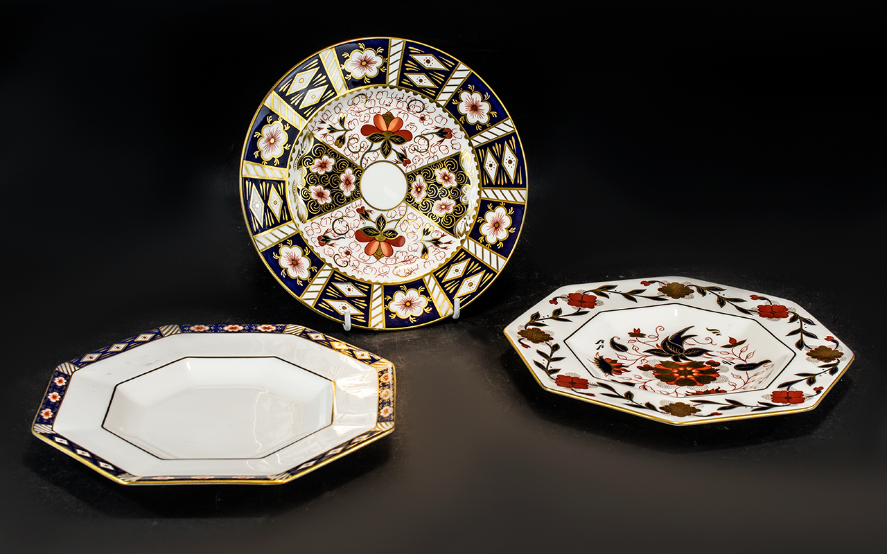 Three Royal Crown Derby Imari Plates model 2451 8687 a.1315. Largest diameter 9 inches.